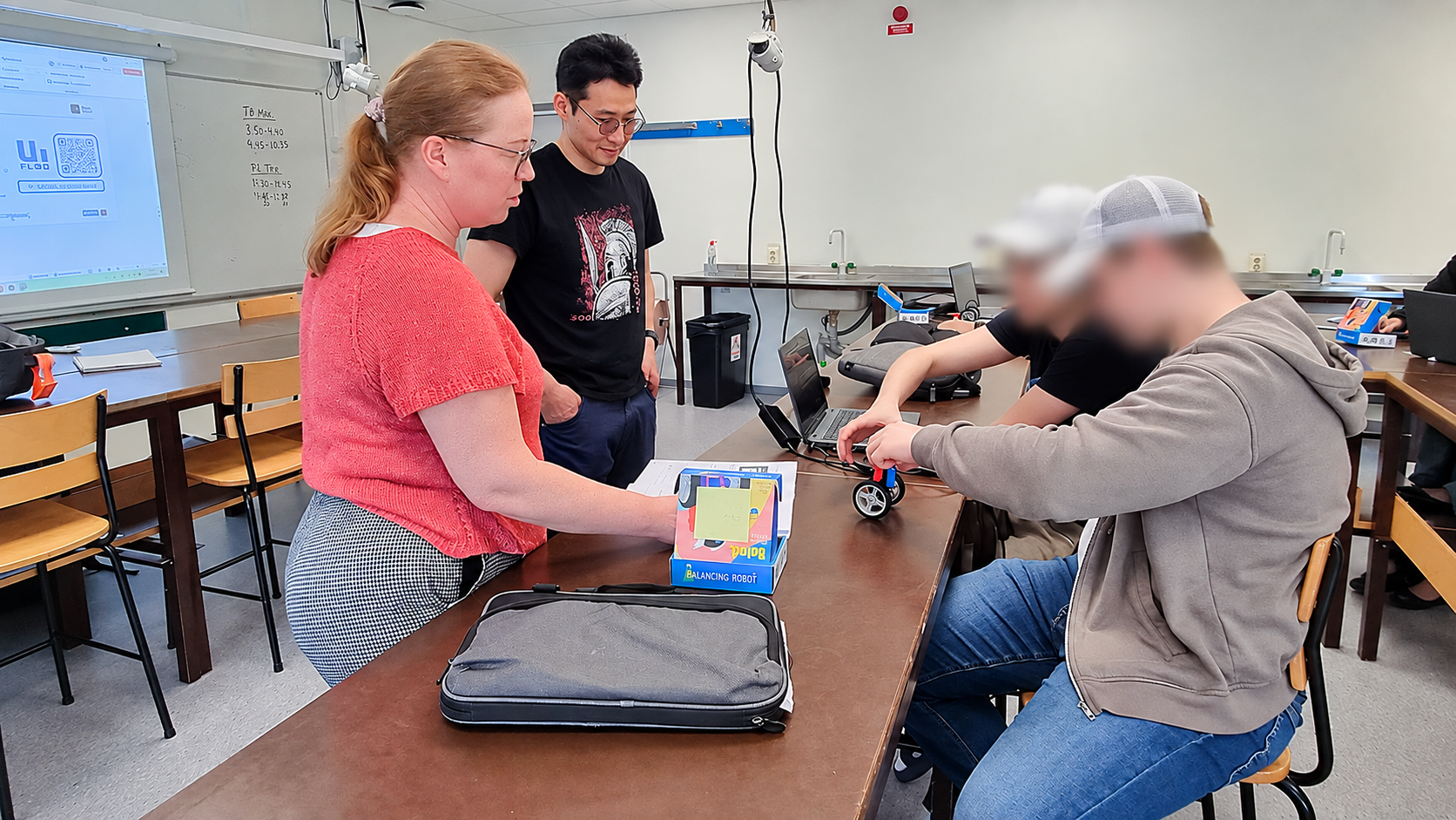 Students working on a balancing robot during an AutoSTEM workshop